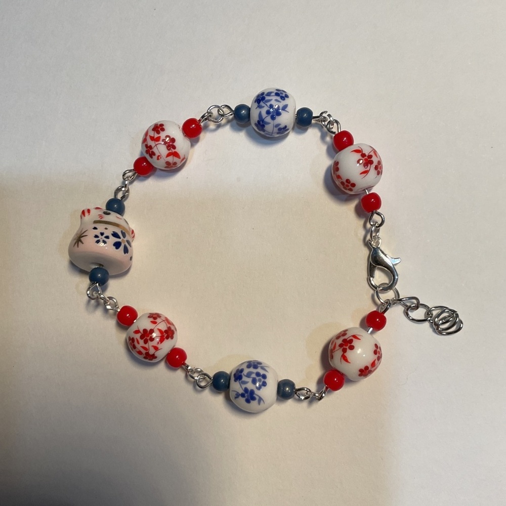 Handmade ceramic bead and Chinese cat bracelet